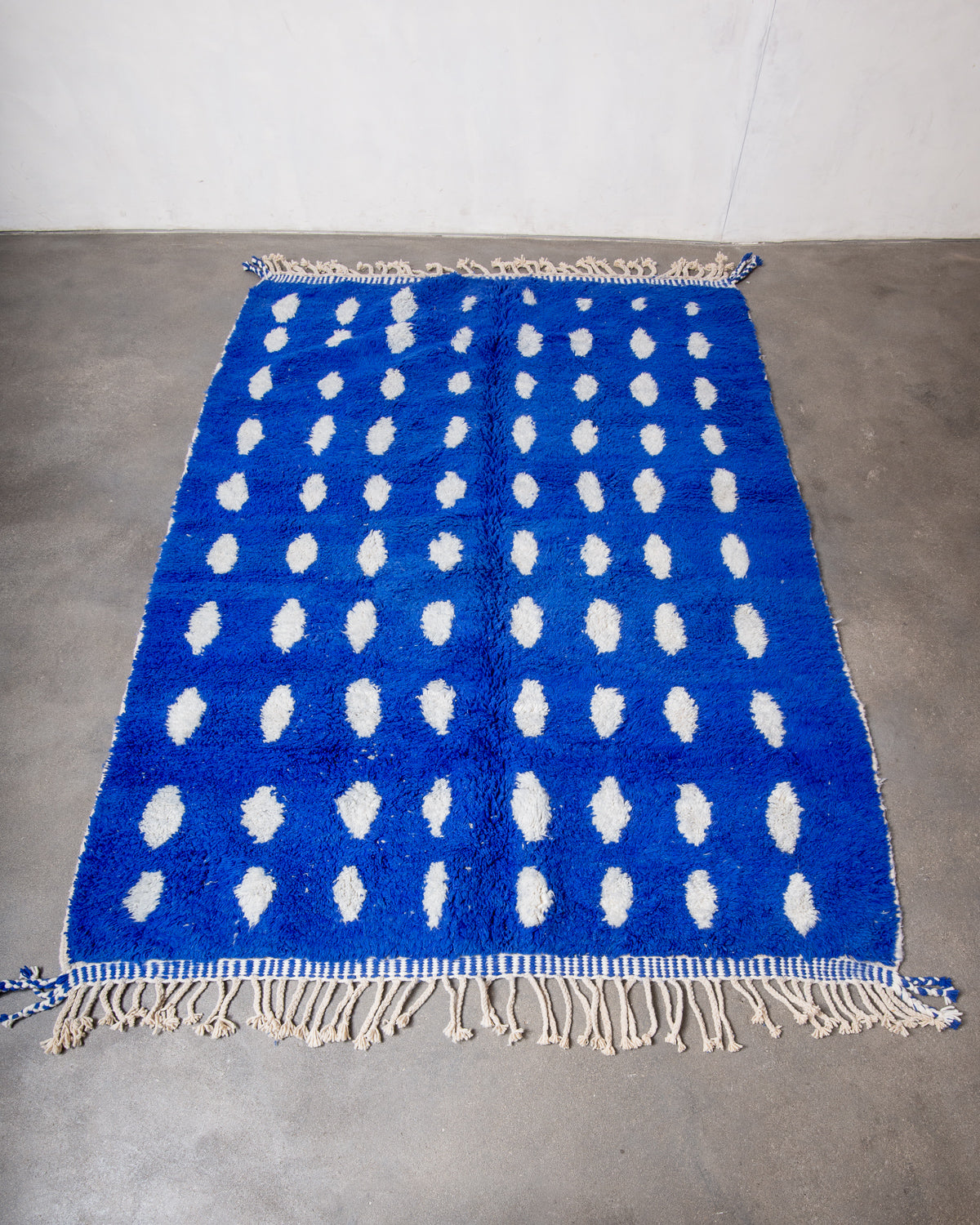 Modern, designer, handcrafted Berber rug from Morocco. Beniourain carpet with beautiful colours and patterns and fluffy wool texture.